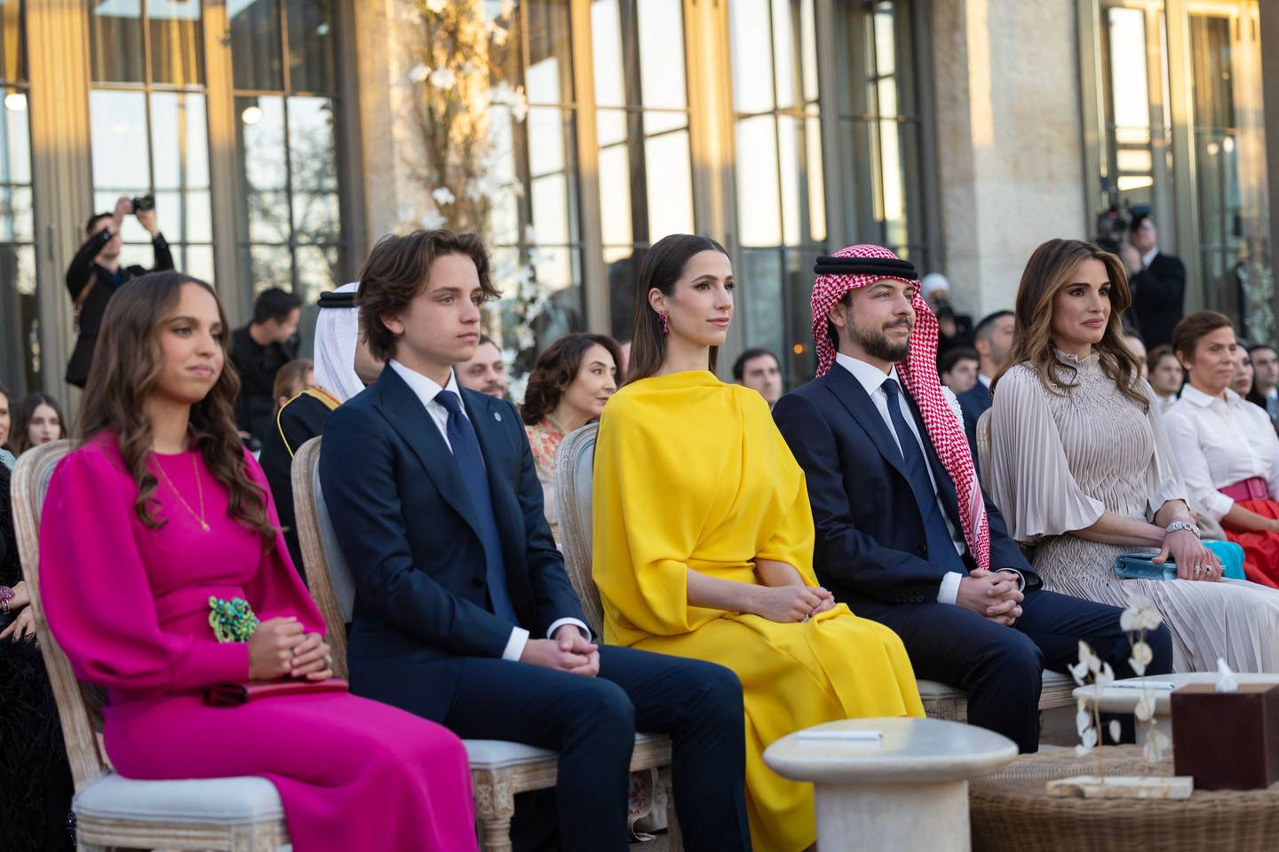From left, Princess Salma, Prince Hashem, Rajwa Al Saif, Crown Prince Hussein and Queen Rania during the wedding ceremony of Princess Iman and Jameel Alexander Thermiotis. AFP