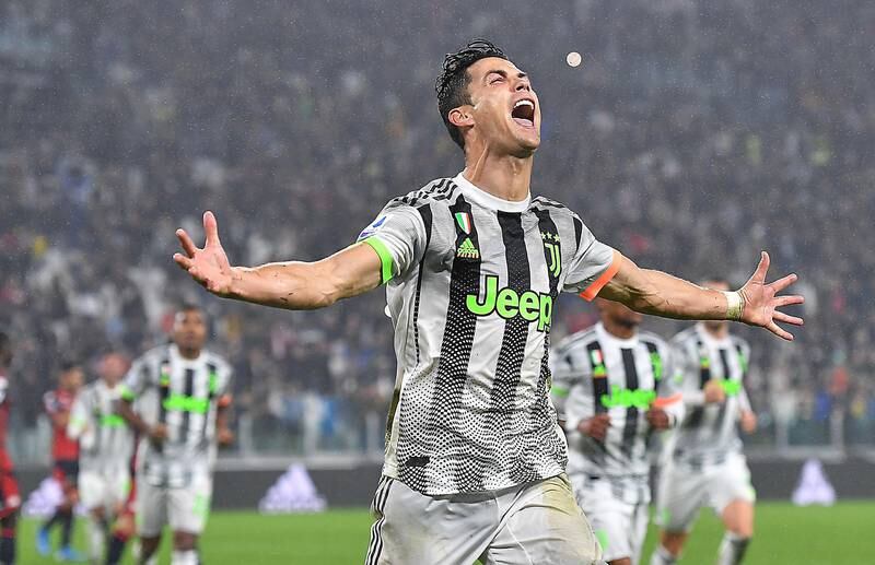epa07961189 Juventus' Cristiano Ronaldo celebrates after scoring during the Italian Serie A soccer match between Juventus FC and Genoa CFC at Allianz stadium in Turin, Italy, 30 October 2019.  EPA/ALESSANDRO DI MARCO