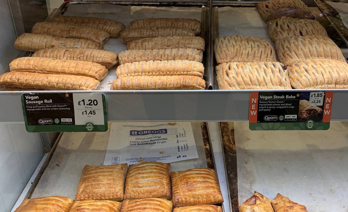 Vegan sausage rolls and steak bakes on sale in a Greggs bakery. The chain is being affected by product shortages. Reuters