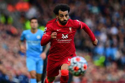 Liverpool's Mohamed Salah runs for the ball. AFP