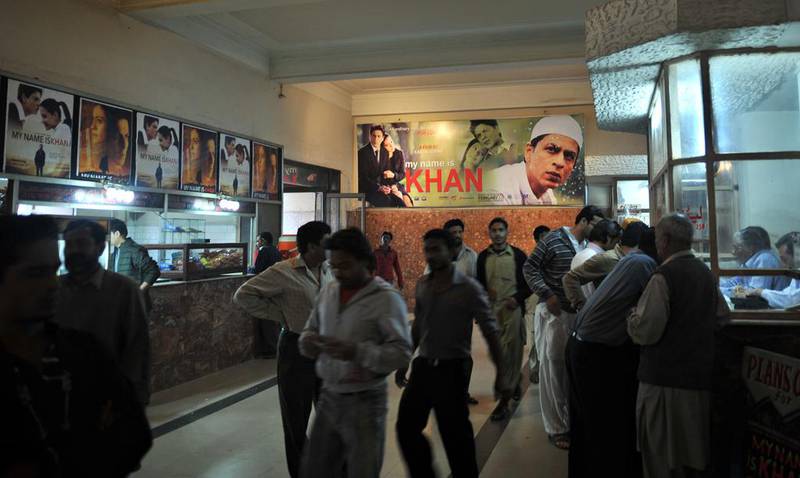 Pakistani moviegoers arrive at a cinema to watch the 2010 Bollywood film My Name is Khan in Karachi. A decades-old ban on Indian films screening in Pakistan was lifted in 2006. Rizwan Tabassum / AFP