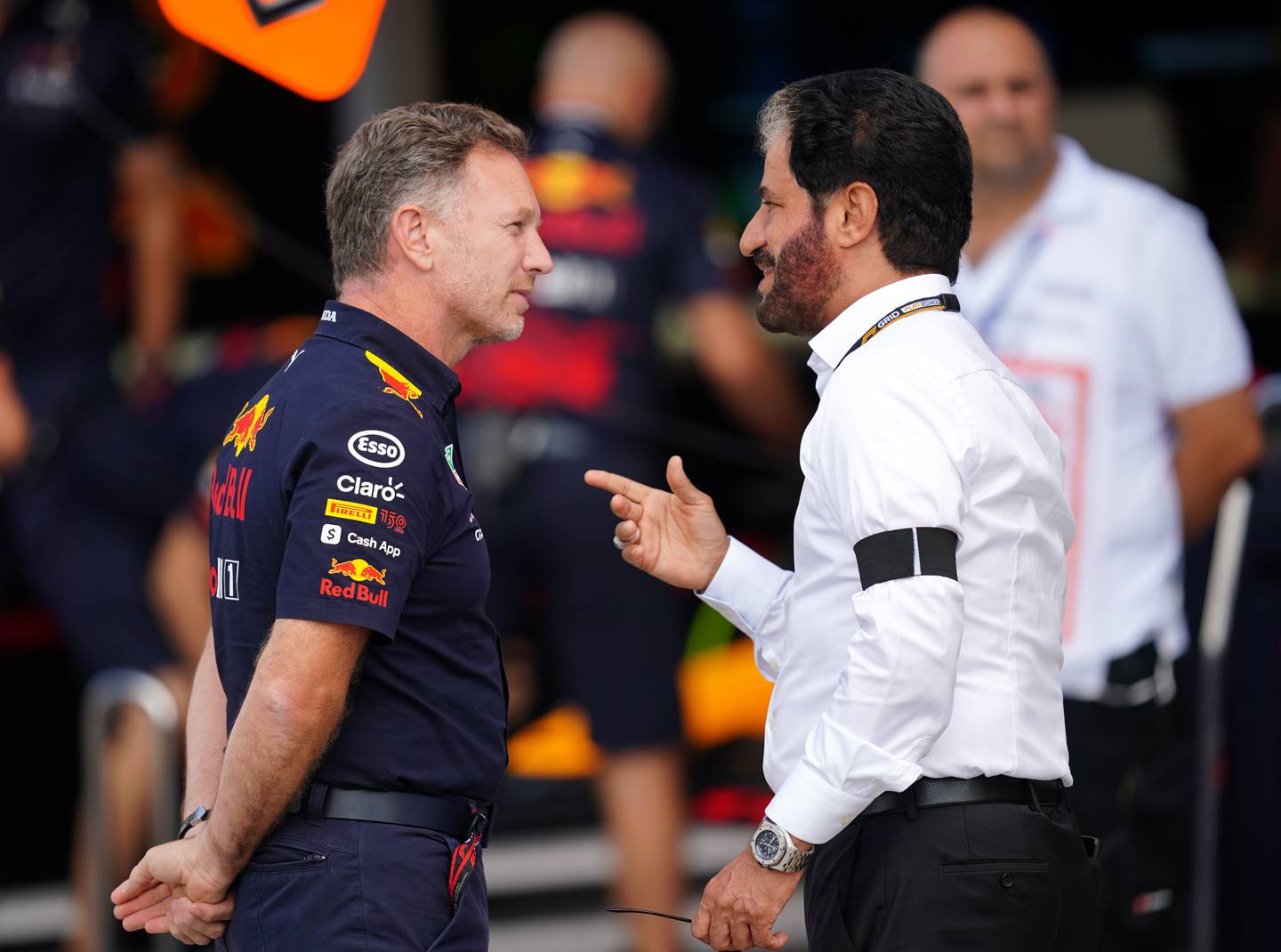 FIA president Mohammed Ben Sulayem, right, speaks with Red Bull Racing team principal Christian Horner. PA