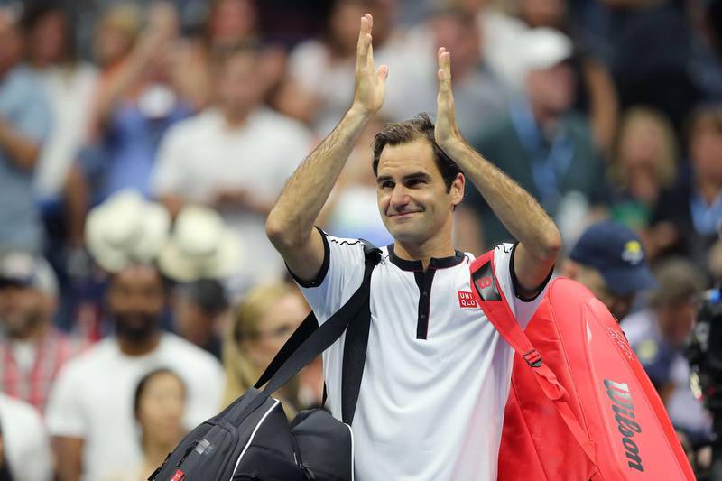 Roger Federer applauds the crowd at Arthur Ashes Stadium after defeating Damir Dzumhur 3-6, 6-2, 6-3, 6-4. EPA