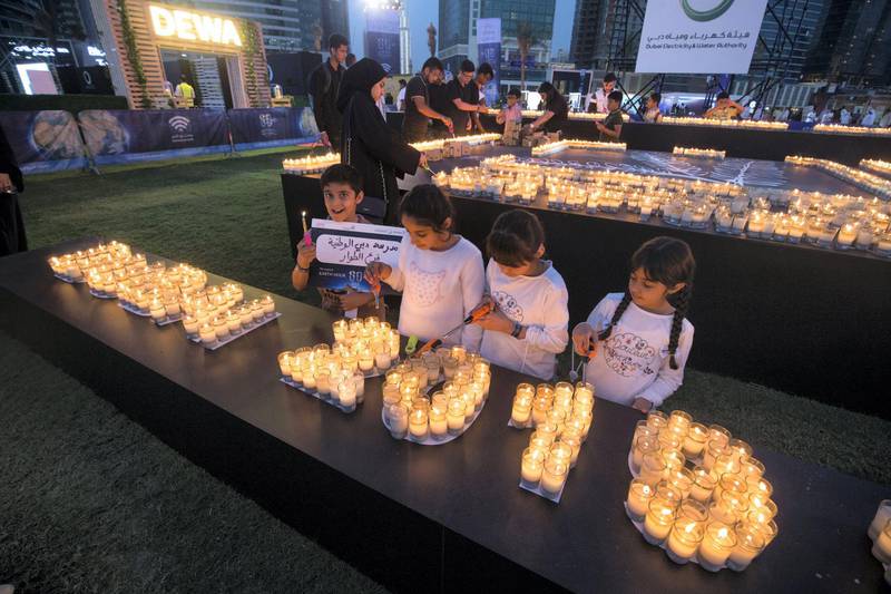 DUBAI, UNITED ARAB EMIRATES - at the DEWA, Earth Hour at Mirasi Promenade, Dubai.  Leslie Pableo for The National