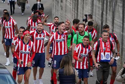 Atletico Madrid´s players celebrate outside the Jose Zorilla stadium in Valladolid after being crowned La Liga champions. AFP