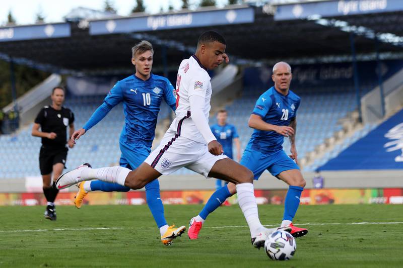 REYKJAVIK, ICELAND - SEPTEMBER 05: Mason Greenwood of England shoots during the UEFA Nations League group stage match between Iceland and England at Laugardalsvollur National Stadium on September 05, 2020 in Reykjavik, Iceland. (Photo by Haflidi Breidfjord/Getty Images)