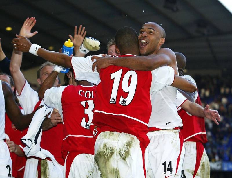 LONDON - APRIL 25:  Thierry Henry of Arsenal celebrates with teammates at the end of the FA Barclaycard Premiership match between Tottenham Hotspur and Arsenal at White Hart Lane on April 25, 2004 in London.  (Photo by Shaun Botterill/Getty Images)