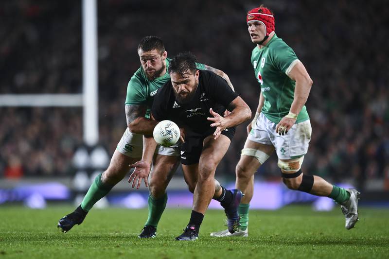 Angus Ta’avao of New Zealand is tackled during the Test match against Ireland at Eden Park. Getty