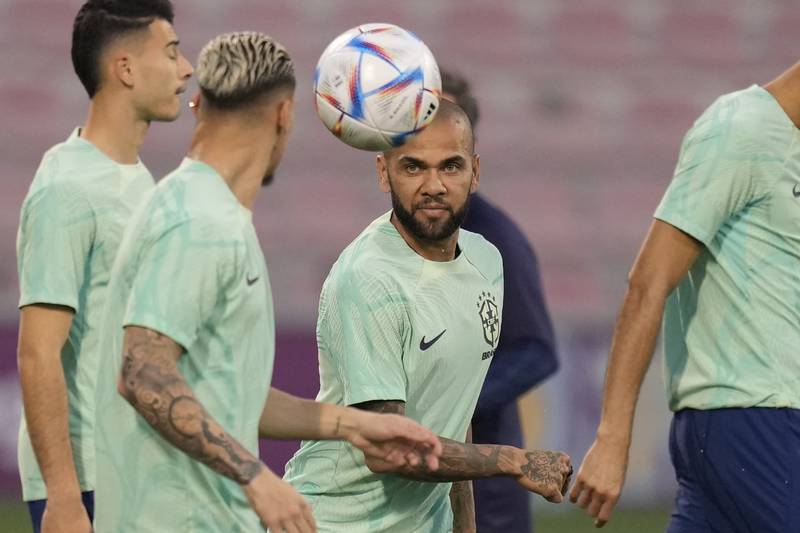 Dani Alves practices with Brazil teammates during a training session. AP
