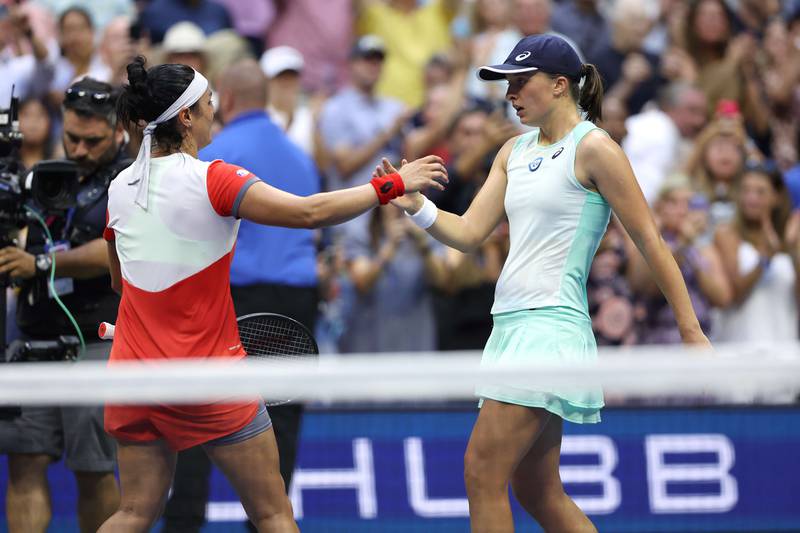Iga Swiatek greets Ons Jabeur after her win in the US Open final. Getty