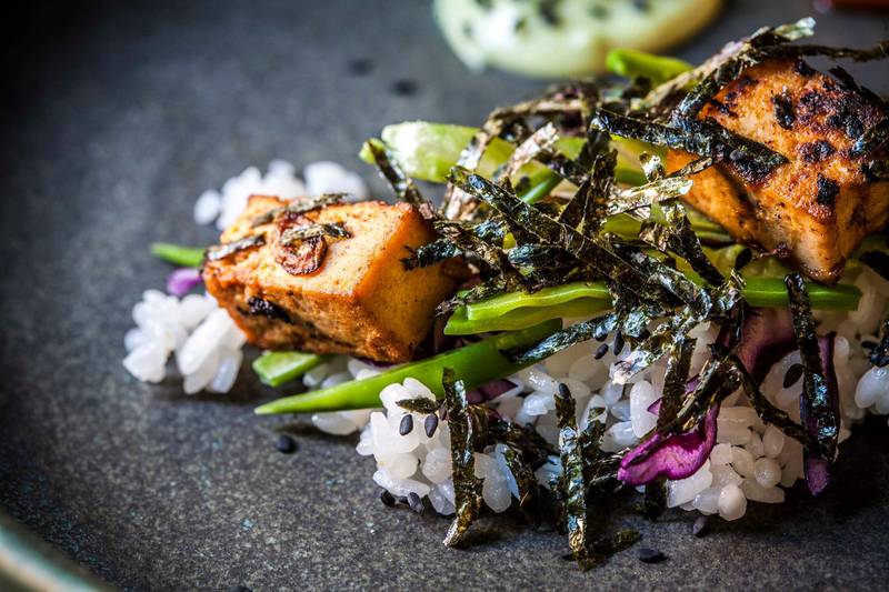 A micro salad of black sesame sushi rice, bbq tofu, shredded nori seaweed, snow peas, iceberg lettuce and red cabbage. Getty Images