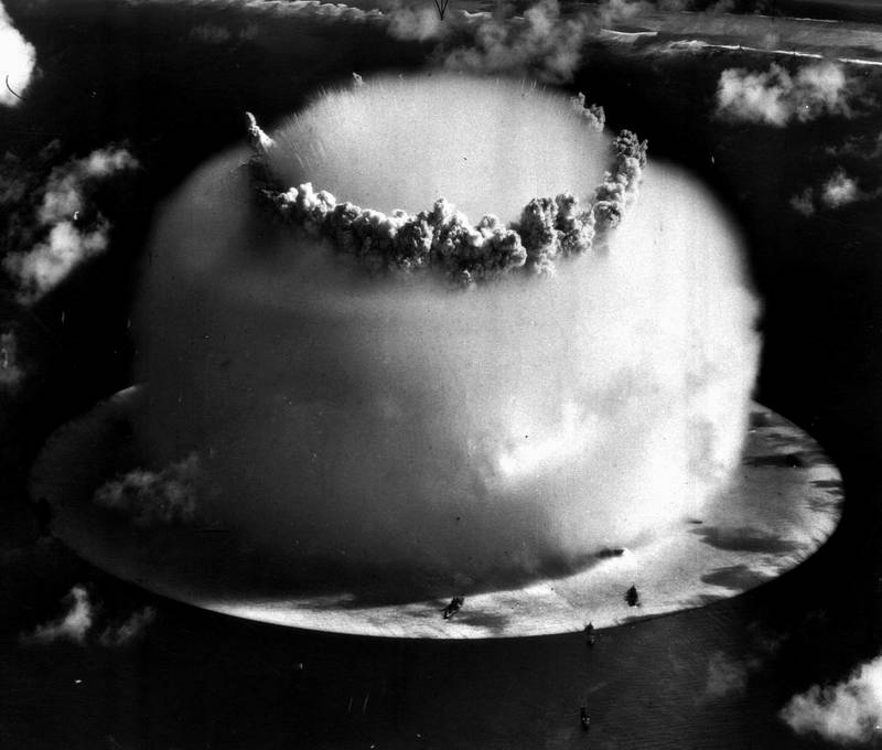 FILE - In this July 25, 1946 file photo, a huge mushroom cloud rises above Bikini atoll in the Marshall Islands following an atomic test blast, part of the U.S. military's "Operation Crossroads." Bikini Atoll in the Marshall Islands remains contaminated by radiation, part of a troubling nuclear testing legacy that continues to affect islands and people across the Pacific long after the U.S., Britain and France stopped their testing programs there. (AP Photo, File)