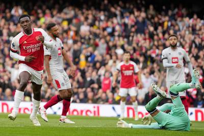 Arsenal's Eddie Nketiah, left, celebrates scoring his side's opener. AP 