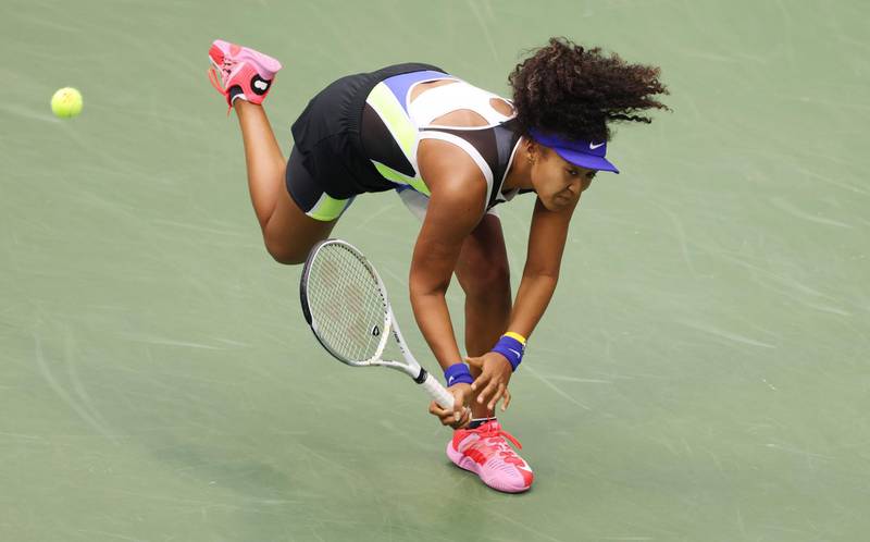 Naomi Osaka hits a return to Victoria Azarenka during the US Open final. EPA