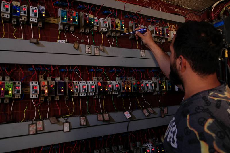 Switches to transfer electricity to private homes in Baghdad. AP