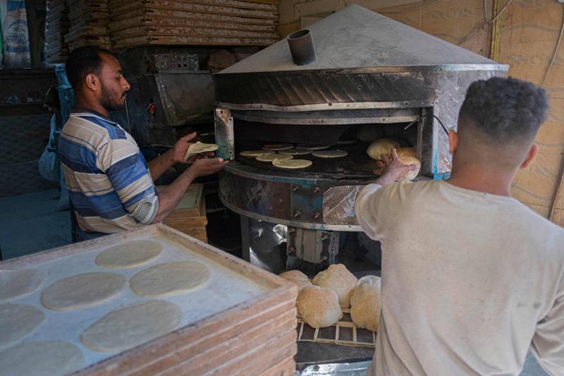 A bakery worker in Cairo. AFP
