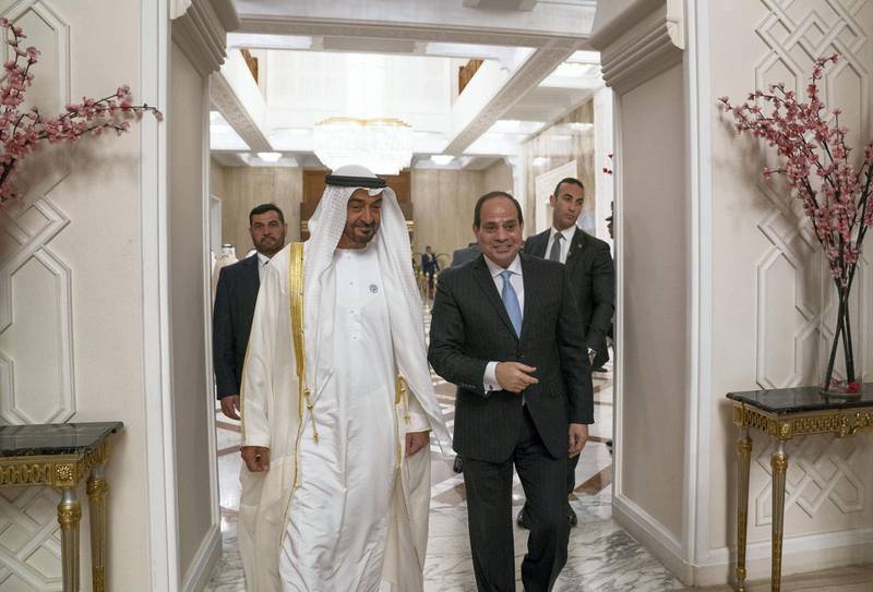CAIRO, EGYPT - April 10, 2018: HH Sheikh Mohamed bin Zayed Al Nahyan, Crown Prince of Abu Dhabi and Deputy Supreme Commander of the UAE Armed Forces (L), speaks with HE Abdel Fattah El Sisi, President of Egypt (R), at Heliopolis Palace, during an official visit. 

( Mohamed Al Hammadi / Crown Prince Court - Abu Dhabi )