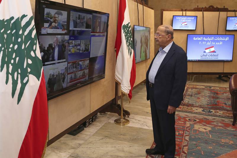 Lebanese President Michel Aoun, follows the parliamentary elections on screens from the presidency palace in Beirut, on May 15. AP