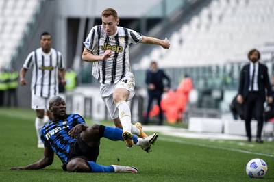 Inter's Romelo Lukaku tackles Dejan Kulusevski of Juve. AP