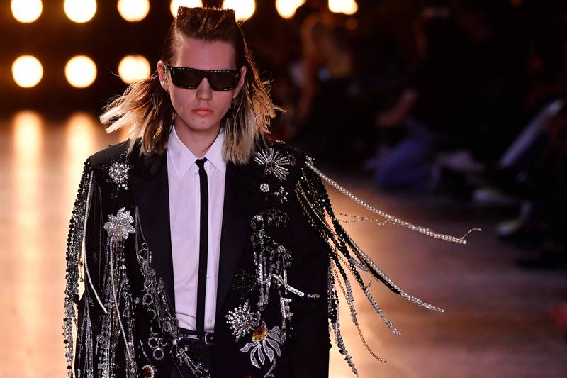 The collection was crammed with clothes imbued with an androgynous rock spirit. AFP