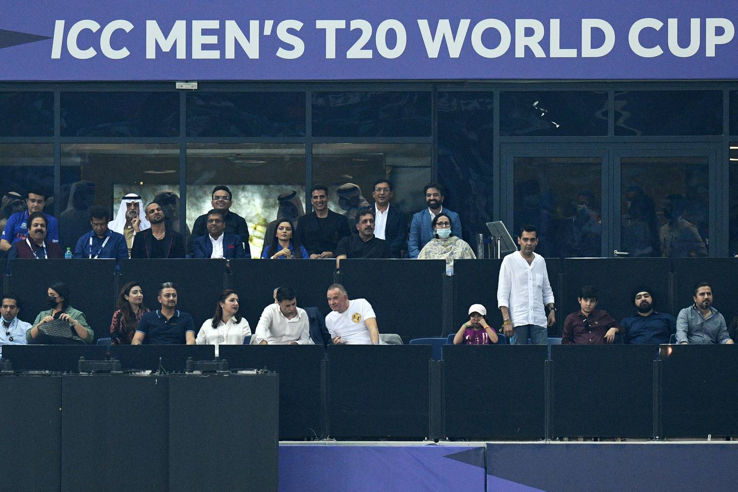 Bollywood actor Akshay Kumar, third from right on the last row, along with dignitaries and officials at the match. AFP