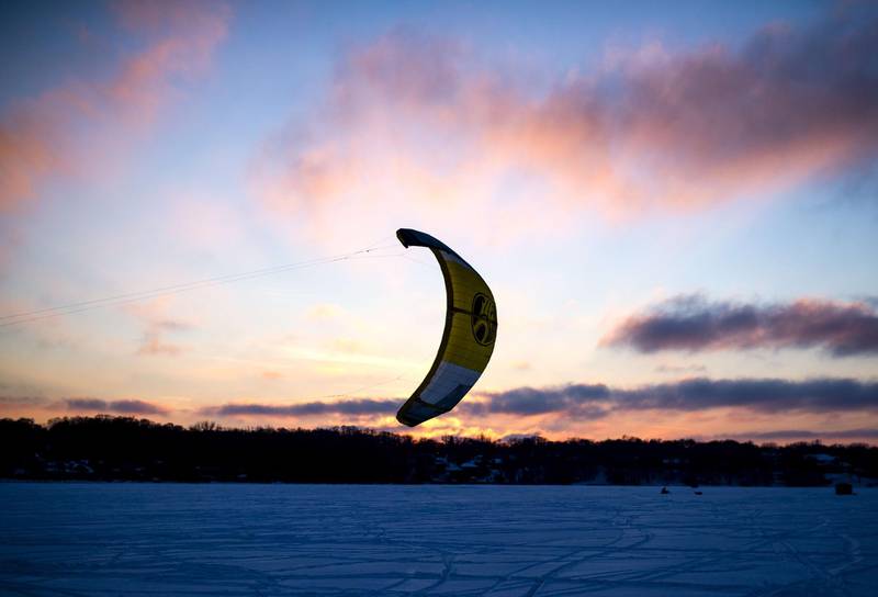 A snowkiting sail hangs in the air over Medicine Lake in Plymouth, Minnesota.AFP