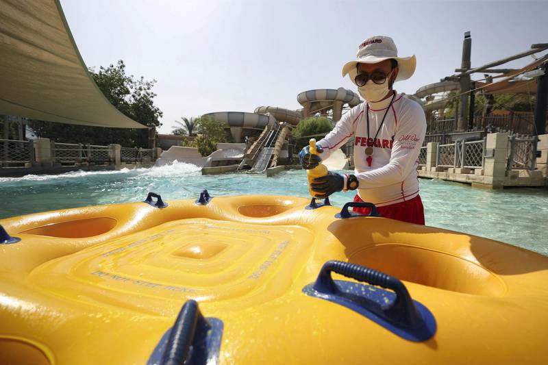 Dubai, United Arab Emirates - Reporter: N/A. News. Tourism. A lifeguard cleans on of the tubes. Wild Wadi opened on Friday to the public with strict Covid-19/Coronavirus safety measures. Sunday, July 12th, 2020. Dubai. Chris Whiteoak / The National