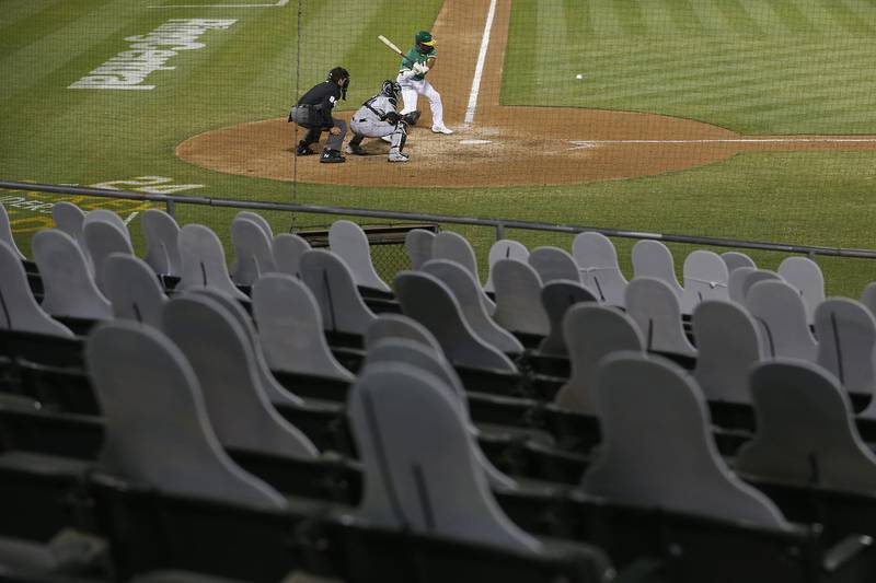 Marcus Semien batting for the Oakland Athletics against the Colorado Rockies at an empty Oakland-Alameda County Coliseum on Tuesday, July 28, 2020. Getty