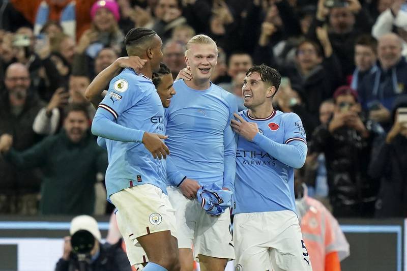 23) Erling Haaland is congratulated by his teammates after scoring the late winner in the 2-1 victory against Fulham at Etihad Stadium on November 5, 2022. AP