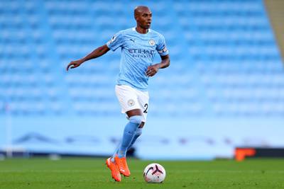 Manchester City's Brazilian midfielder Fernandinho runs with the ball during the English Premier League football match between Manchester City and Leicester City at the Etihad Stadium in Manchester, north west England, on September 27, 2020. (Photo by Catherine Ivill / POOL / AFP) / RESTRICTED TO EDITORIAL USE. No use with unauthorized audio, video, data, fixture lists, club/league logos or 'live' services. Online in-match use limited to 120 images. An additional 40 images may be used in extra time. No video emulation. Social media in-match use limited to 120 images. An additional 40 images may be used in extra time. No use in betting publications, games or single club/league/player publications. / 
