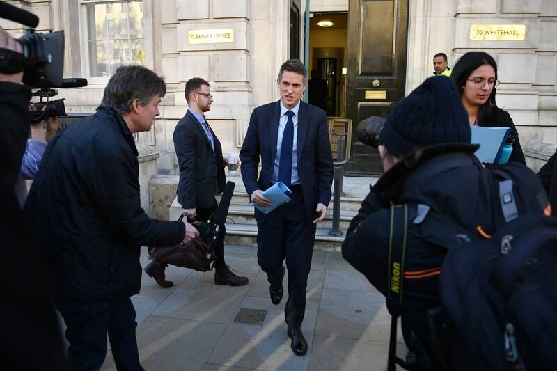 Gavin Williamson leaving the Cabinet Office after attending a Cobra meeting before the first daily public updates on the coronavirus pandemic, in March 2020. Getty Images