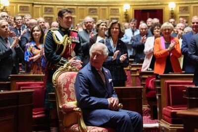 French Senators and members of the National Assembly greet King Charles. EPA