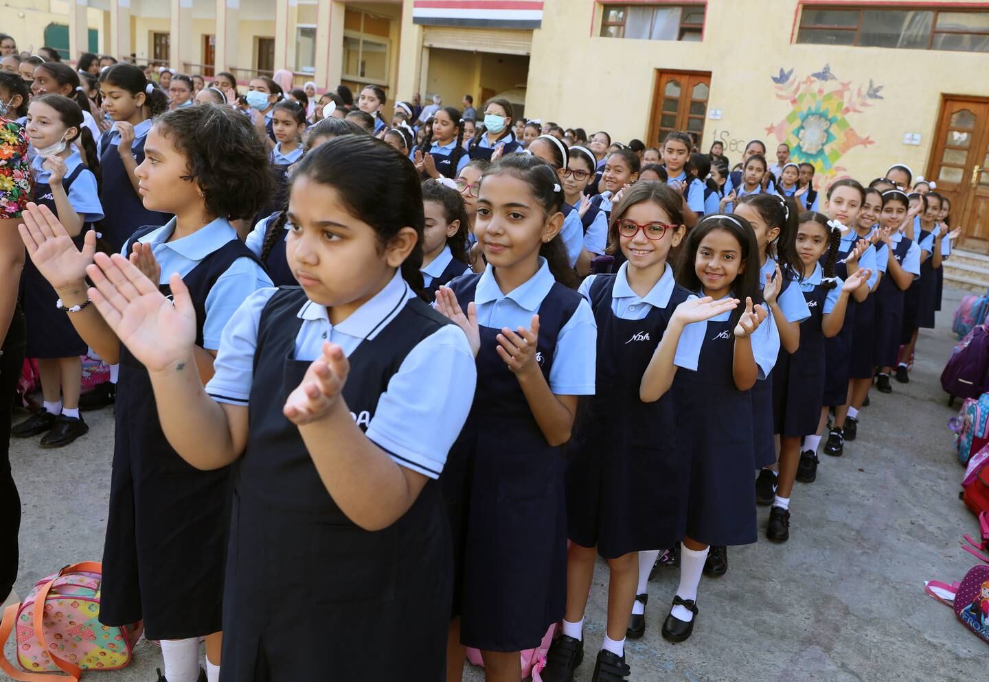 Schoolgirls during assembly at a private school in Cairo, Egypt. EPA