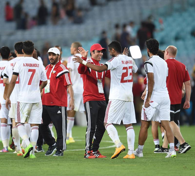 Coach Mahdi Ali congratualtes Mohamed Ahmad Gharib following a penalty kick victory over Japan during the 2015 Asian Cup in Melbourne, Australia on Januaury 23, 2015 (Courtesy UAE FA) *** Local Caption ***  sp24ja-Pg3_COACH1.jpg