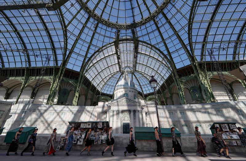 For his autumn /winter 2018 haute couture collection,  Karl Lagerfeld rebuilt the Left Bank of Paris inside the Grand Palais.  EPA