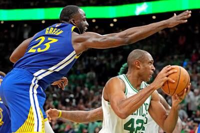 Al Horford drives to the basket against Golden State Warriors forward Draymond Green. USA TODAY Sports