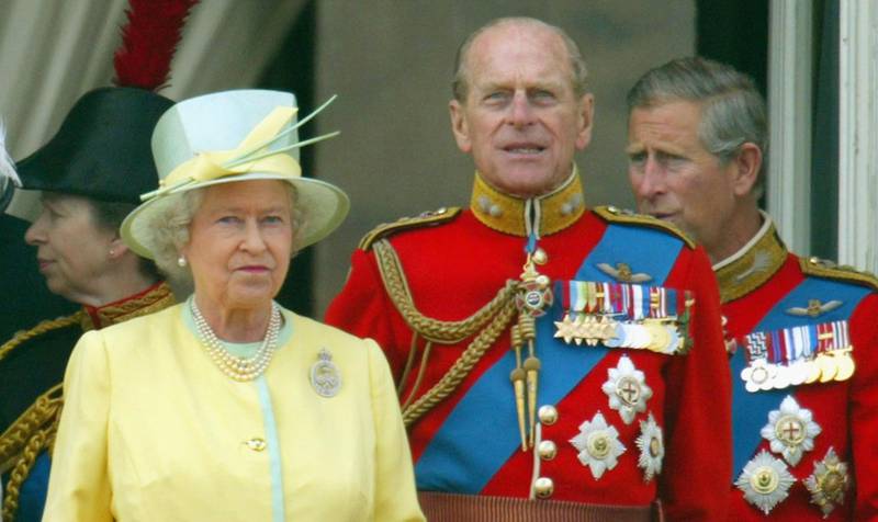 LONDON - JUNE 12:  Britain's Queen Elizabeth II alongside the Duke of Edinburgh with Prince Charles (R) and Princess Anne, seen on the balcony of Buckingham Palace after attending the Trooping the Colour ceremony to mark the Queen's official birthday at Horse Guards Parade on June 12, 2004 in London, England. (Photo by Scott Barbour/Getty Images)   