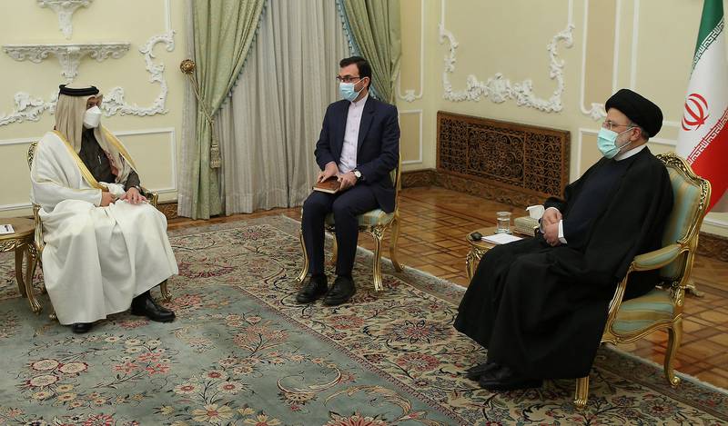 Qatar's Foreign Minister Sheikh Mohammed bin Abdulrahman meets Iranian President Ebrahim Raisi in Tehran on January 27, 2022. Reuters