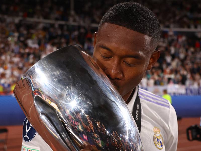 Real Madrid's David Alaba celebrates with the trophy after winning the European Super Cup. The Austrian opened the scoring in a 2-0 win. AP
