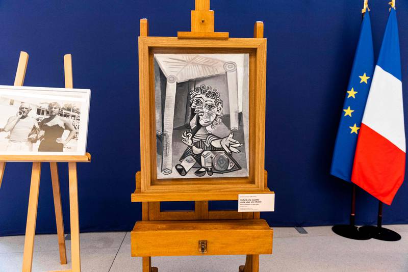A painting by Spanish painter Pablo Picasso entitled 'The child with the lollipop sitting under a chair' was given to the French state by the artist's family. AFP
