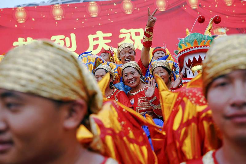 People celebrate after Beijing was chosen to host the 2022 Winter Olympics. Damir Sagolj / Reuters