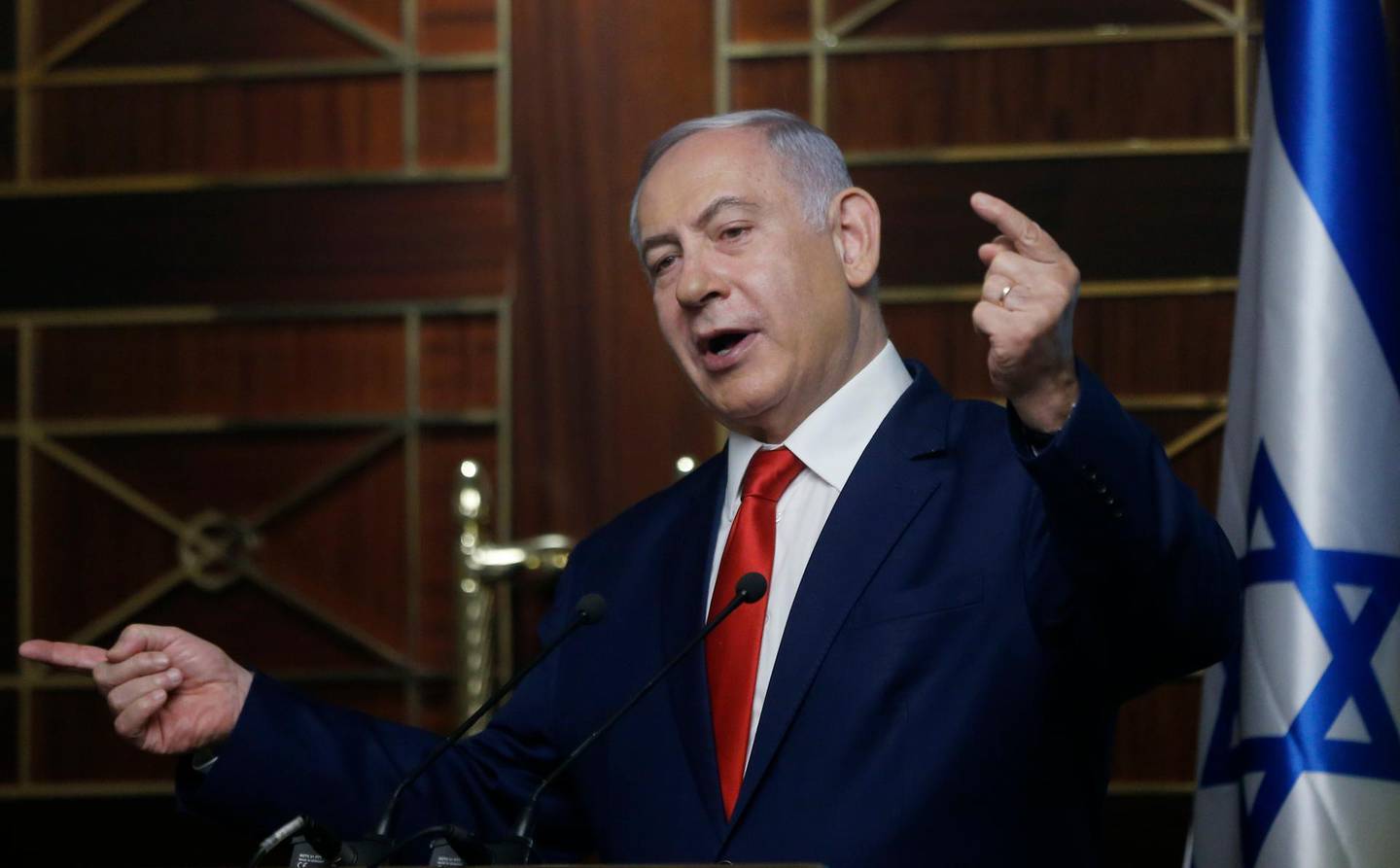 FILE - In this Tuesday, Aug. 20, 2019 file photo, Israeli Prime Minister Benjamin Netanyahu delivers a speech in Kyiv, Ukraine. The long shadow war between Israel and Iran has burst into the open in recent days, with Israel allegedly striking Iran-linked targets as far away as Iraq and crash-landing two drones in Lebanon. These incidents, along with an air raid in Syria that Israel says thwarted an imminent Iranian drone attack, have raised tensions at a particularly fraught time. (AP Photo/Efrem Lukatsky, File)