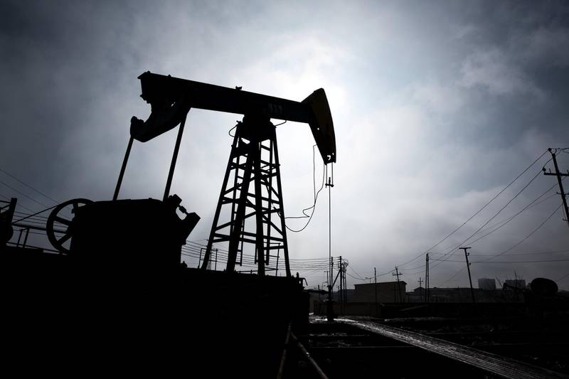 A pumpjack is silhouetted as it operates in Baku, Azerbaijan, on Sunday, March 18, 2018. Two years after descending into junk, Azerbaijan's shortest path to winning back its investment grade is by rebuilding the stash of petrodollars it raided during a recession and a banking meltdown, according to Fitch Ratings. Photograph: Taylor Weidman/Bloomberg