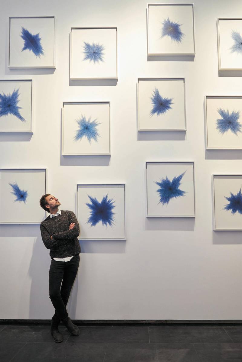 Idris Khan with his installation which will be on display at The Albukhary Foundation Gallery of the Islamic World. Courtesy The British Museum