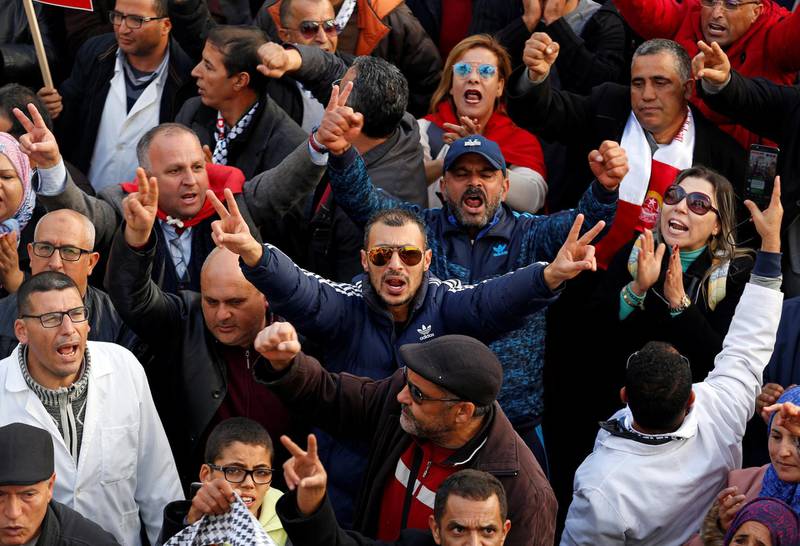 University professors and teachers take part in a protest to demand higher wages in Tunis, Tunisia December 19, 2018. REUTERS/Zoubeir Souissi