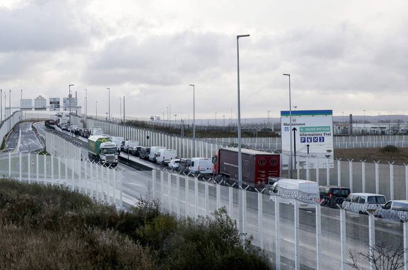 Vehicles queue at the entrance to the Port of Calais in November. AFP