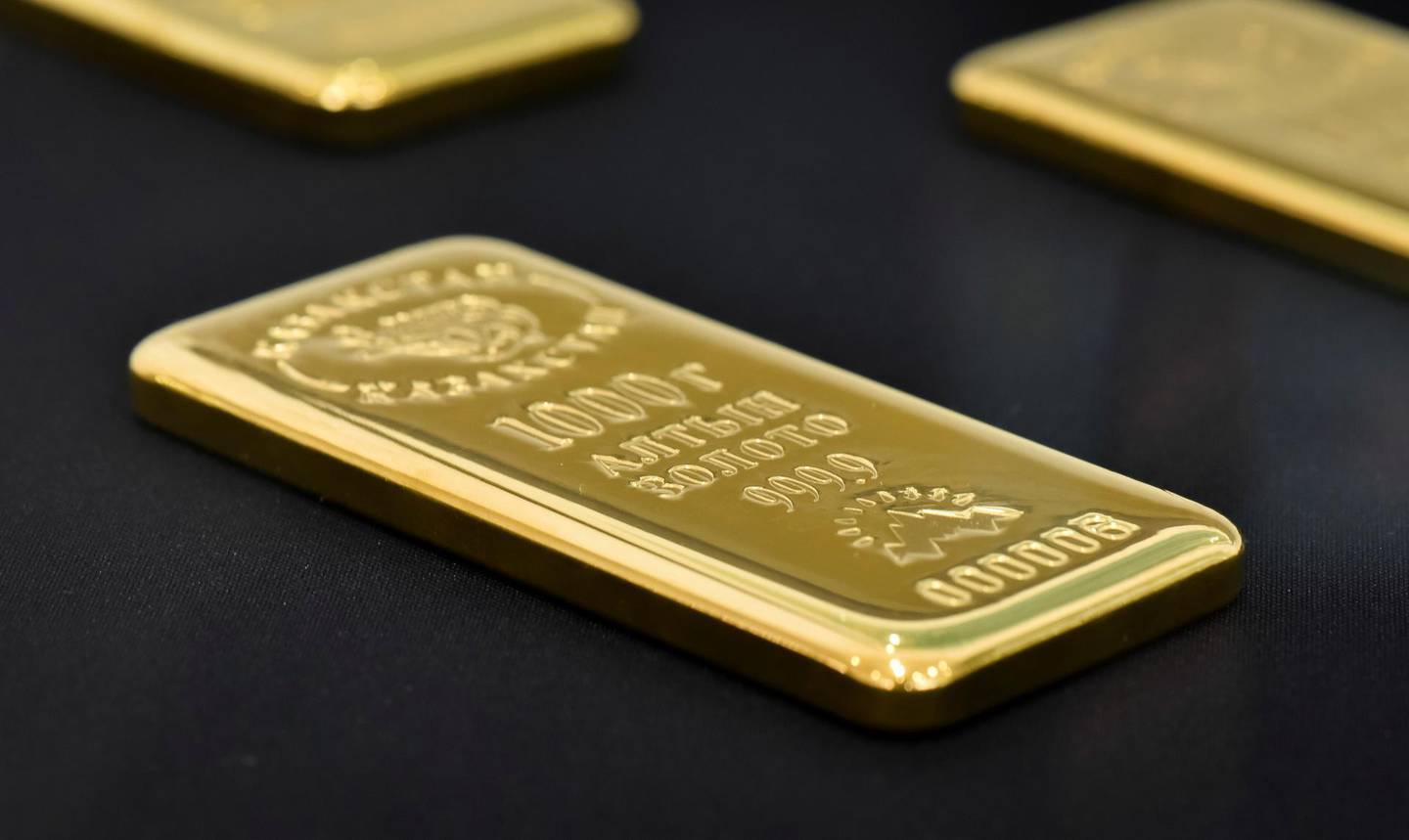 FILE PHOTO: A 1000 gram gold bar is seen at the Kazakhstan's National Bank vault in Almaty, Kazakhstan September 15, 2017. REUTERS/Mariya Gordeyeva/File Photo
