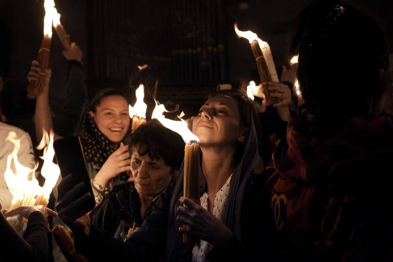 Eastern Orthodox Christians believe the 'Holy Fire' spontaneously lights other lamps and candles around the church and reaches Jerusalem and even foreign countries. AFP