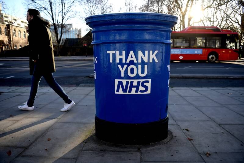 A message for the National Health Service on a postbox outside St Thomas' Hospital in London. EPA