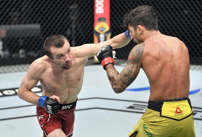 ABU DHABI, UNITED ARAB EMIRATES - JULY 19: (L-R) Askar Askarov of Russia punches Alexandre Pantoja of Brazil in their flyweight bout during the UFC Fight Night event inside Flash Forum on UFC Fight Island on July 19, 2020 in Yas Island, Abu Dhabi, United Arab Emirates. (Photo by Jeff Bottari/Zuffa LLC via Getty Images) *** Local Caption *** ABU DHABI, UNITED ARAB EMIRATES - JULY 19: (L-R) Askar Askarov of Russia punches Alexandre Pantoja of Brazil in their flyweight bout during the UFC Fight Night event inside Flash Forum on UFC Fight Island on July 19, 2020 in Yas Island, Abu Dhabi, United Arab Emirates. (Photo by Jeff Bottari/Zuffa LLC via Getty Images)